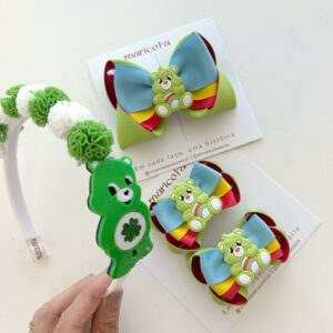 Tiara pompom malha aplique luxo
